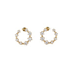 Best Case Scenario Earrings featuring a graduated line of cubic zirconia stones in a modern hoop design.