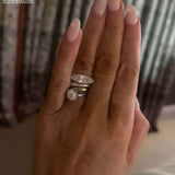 The Rest Of The World Can Wait East-West Silver Ring displayed on a hand with stylish nails.