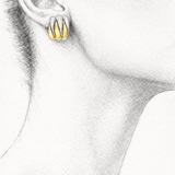 Wild Thing Two-Tone Zig-Zag Earrings showcased on a model, featuring a modern gold and silver design.