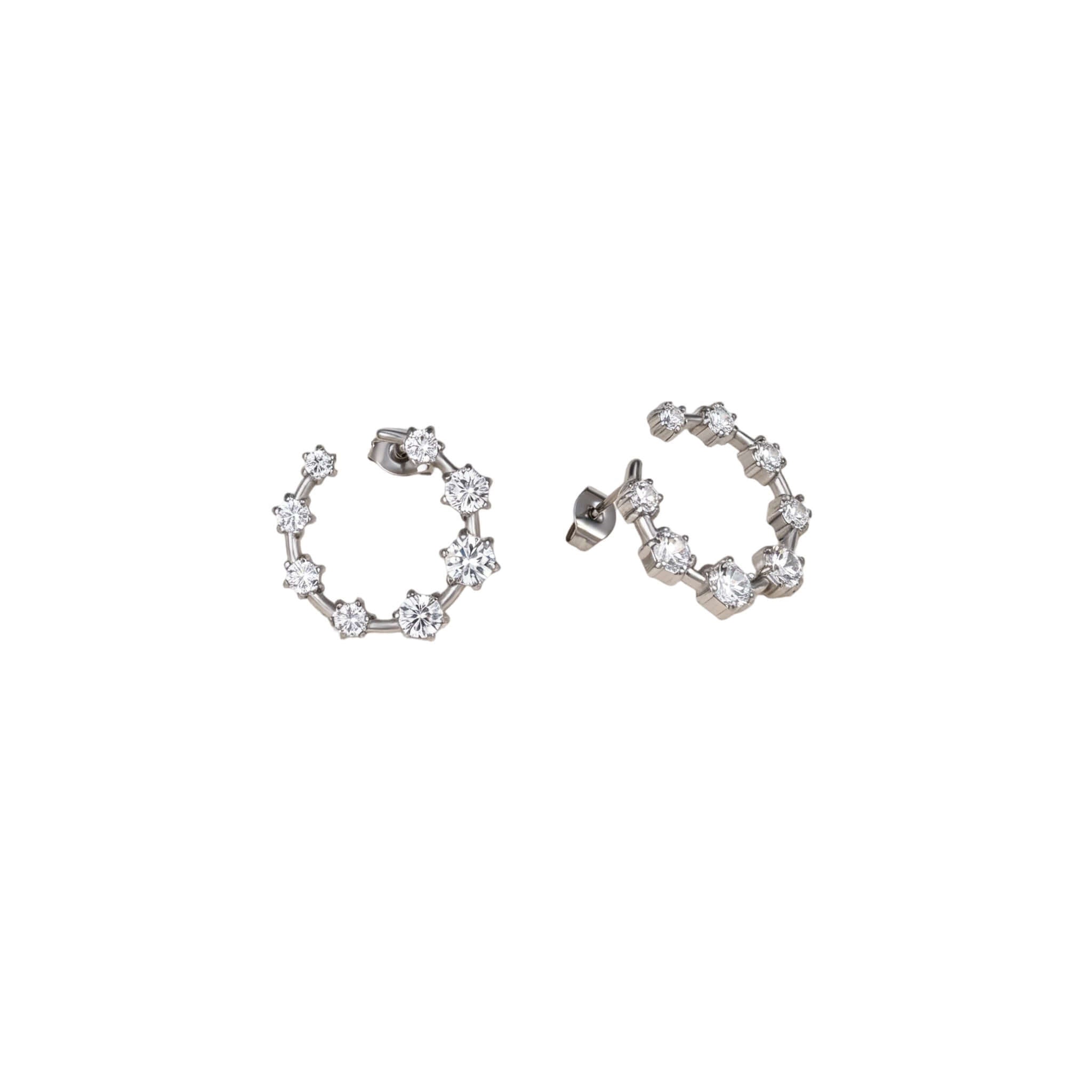 Best Case Scenario Earrings featuring graduated cubic zirconia stones in an open hoop design.