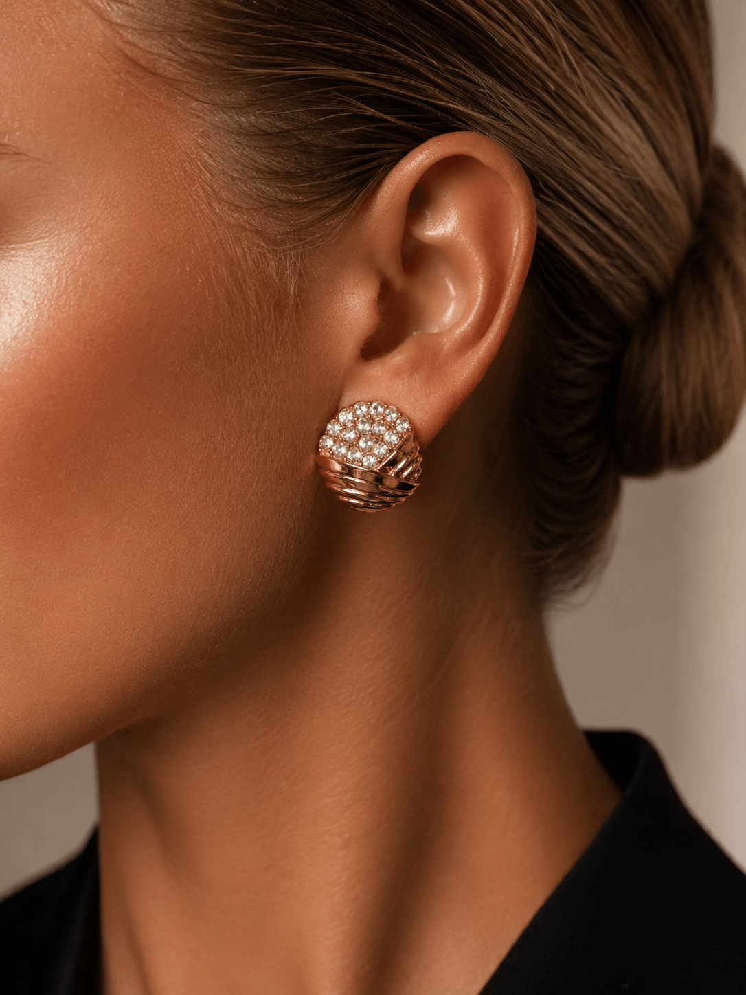 Woman wearing Don’t Overthink It Gold Earrings with sparkling pavé-set stones and textured gold detailing.
