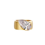 A Wonderful Thing Tilted Pear Cigar Band Ring with a stunning cubic zirconia and luxurious 14K PVD gold plating.