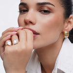 You Got This Pear Cut Halo Ring worn by model, showcasing its elegant design and stunning cubic zirconia detail.