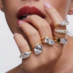 Your Level Of Audacity Ring worn by a model showcasing multiple rings with sparkling cubic zirconia stones.