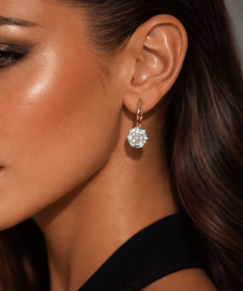 Model wearing I’m Not Like The Rest Two-Tone Earrings showcasing cubic zirconia stones in elegant design.