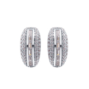 Flex Silver Pavé Huggie Earrings With Baguette Accent Stones featuring sparkling round and baguette-cut CZ.