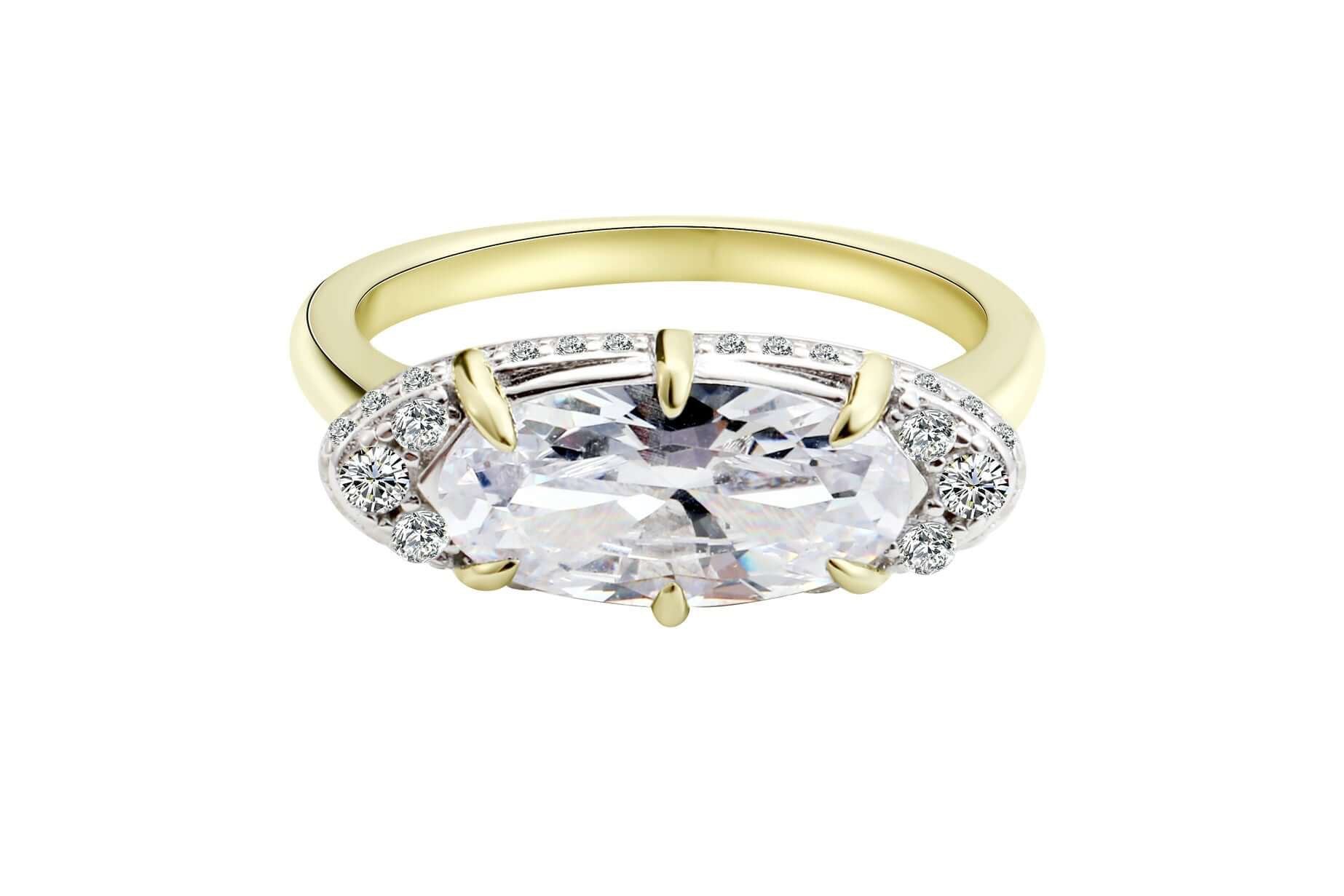 The Rest Of The World Can Wait East-West Gold Ring featuring a bold design with a central stone and detailed basket accents.