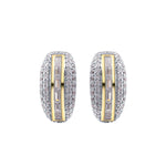 Flex Two Tone Pavé Huggie Earrings With Baguette Accent Stones featuring sparkling round stones and baguette-cut CZ.