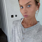 You Are Perfect Gold Hoop Earrings worn by a model with a grey sweater and natural makeup, showcasing elegance and style.
