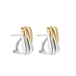 Wild Thing Two-Tone Zig-Zag Earrings with gold and silver tones showcasing a modern design.