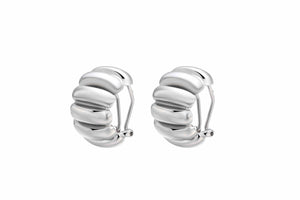 The Best Silver Hoop Earrings featuring a sculptural and chic design crafted from rhodium-plated brass.