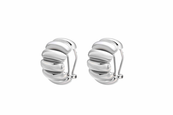 The Best Silver Hoop Earrings featuring a sculptural and chic design crafted from rhodium-plated brass.