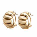 The Best Gold Hoop Earrings crafted from brass with luxurious 14k gold plating for a chic look.