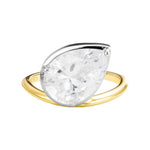 You Got This Pear Cut Halo Ring featuring a pear cut cubic zirconia on a sterling silver and gold band.