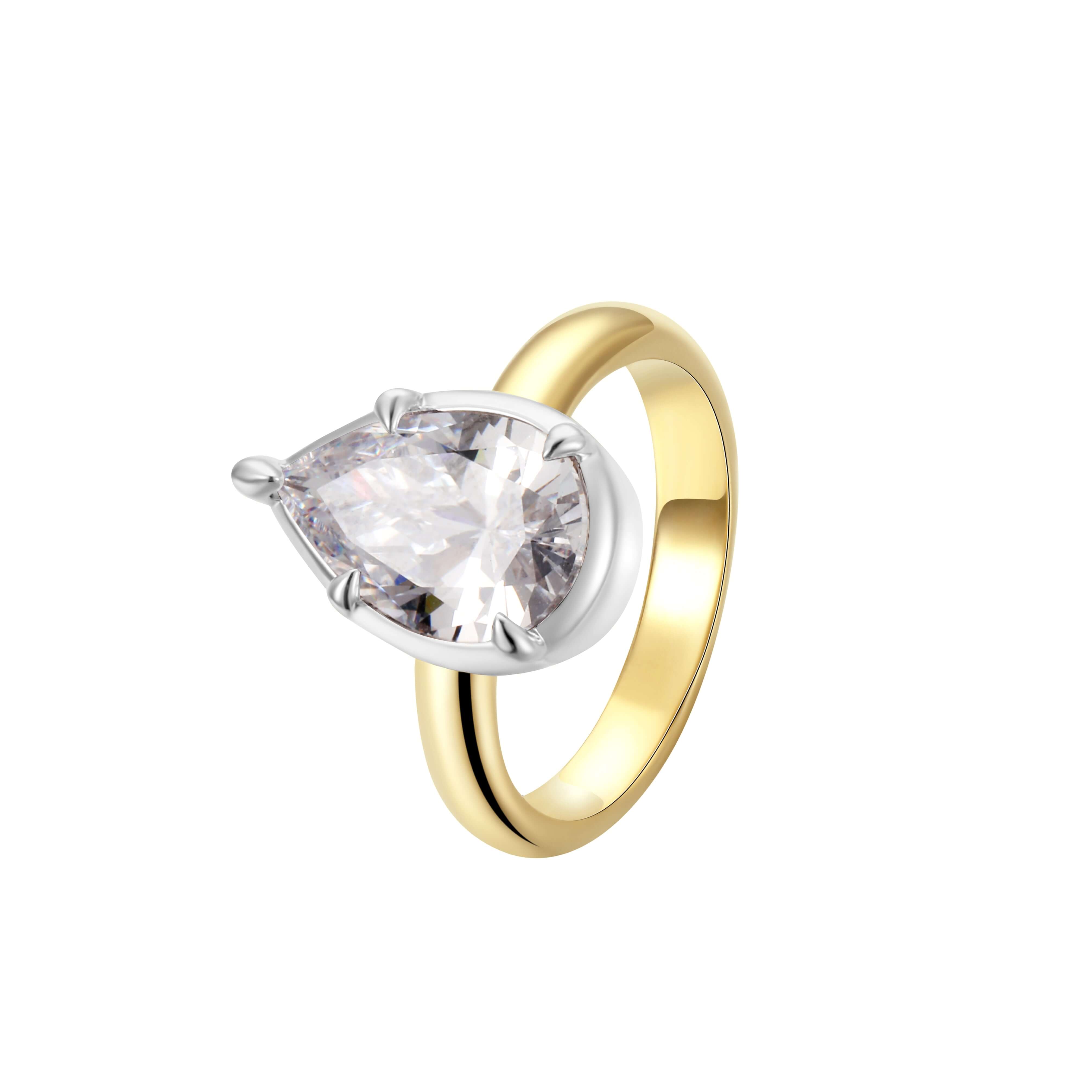 Excited About Everything Pinky Ring featuring an oversized pear-cut cubic zirconia in a two-tone finish.