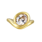 Bonjour Mon Amour Ring featuring a smooth sculptural design and an oversized round-cut stone in gold.
