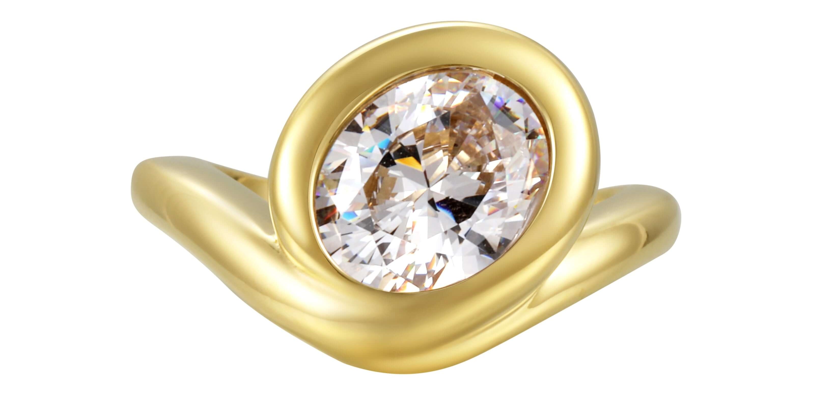 Bonjour Mon Amour Ring featuring a smooth sculptural design and an oversized round-cut stone in gold.