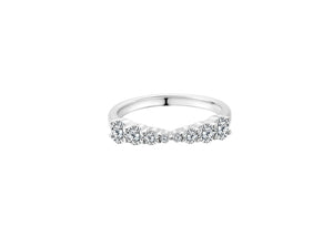 Little By Little Silver Stacking Ring featuring a sleek band and sparkling stones.