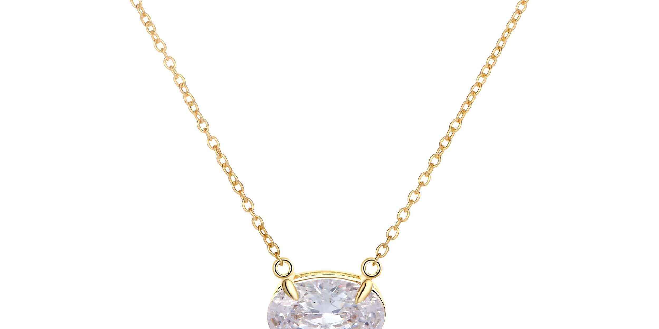 True Love Story Oval Solitaire Necklace featuring a brilliant CZ stone in a sleek setting on a delicate gold chain.