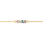 Don't Forget To Smile Today Bracelet featuring a rainbow CZ design on a gold-plated chain.