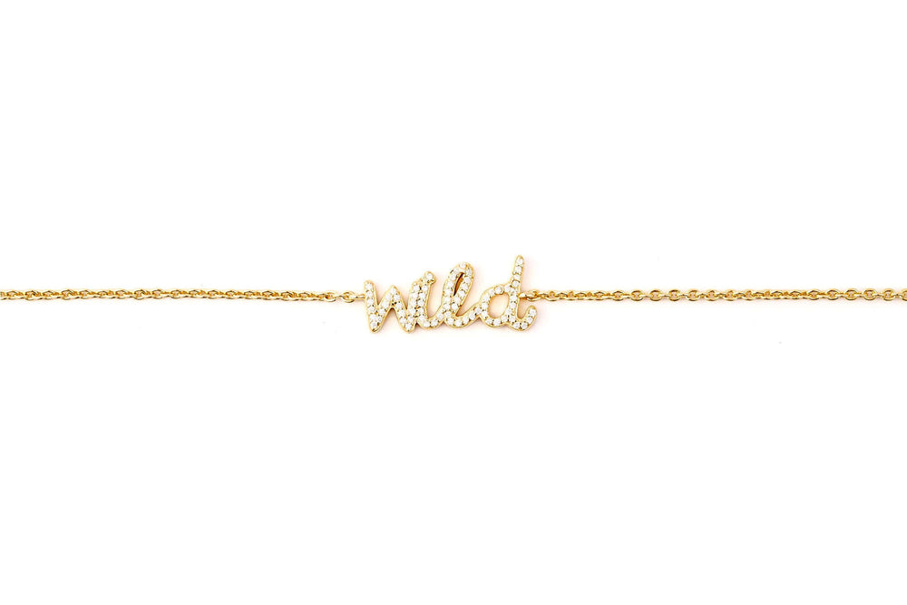 Wild Like The West Script Bracelet in 14k gold plating with adjustable sizing for a perfect fit.