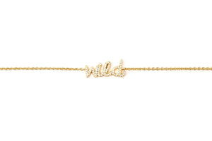 Wild Like The West Script Bracelet in 14k gold plating with adjustable sizing for a perfect fit.