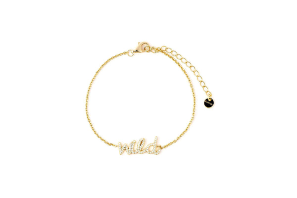 Wild Like The West Script Bracelet in 14k gold plating with adjustable sizing for a perfect fit.