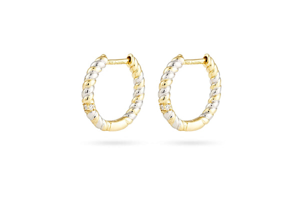 Plot Twist Mixed Metal Hoop Earrings, elegantly crafted with mixed metals for a refined statement accessory.