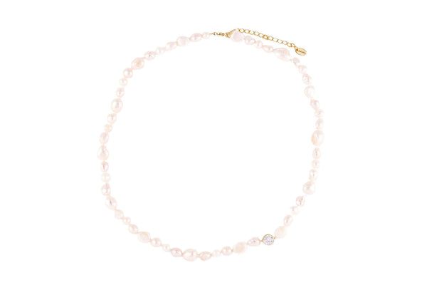Pearl's A Singer Necklace featuring freshwater pearls on a 925 sterling silver chain with 14k gold plating and cubic zirconia.