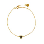 She's So Lucky Black Heart Bracelet featuring a black CZ heart pendant and adjustable gold chain.