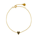 She's So Lucky Black Heart Bracelet featuring a black CZ heart pendant and adjustable gold chain.