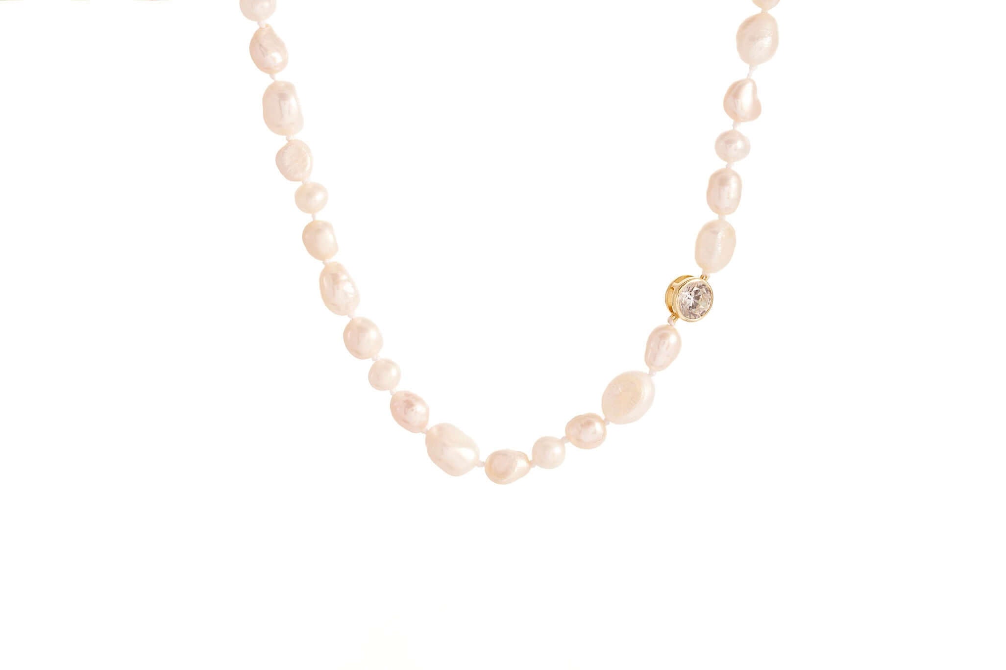 Pearl's A Singer Necklace 925 Sterling Silver 14K Gold Plated with cultured freshwater pearls and cubic zirconia accent.