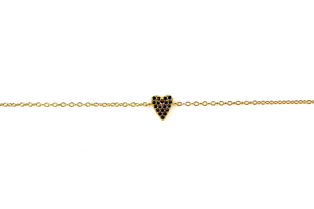 She's So Lucky Black Heart Bracelet featuring a black CZ heart pendant on a gold-plated chain.