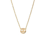 Wild Smile Emoji Necklace featuring a gold plated smiling emoji pendant with heart eyes on a delicate chain.