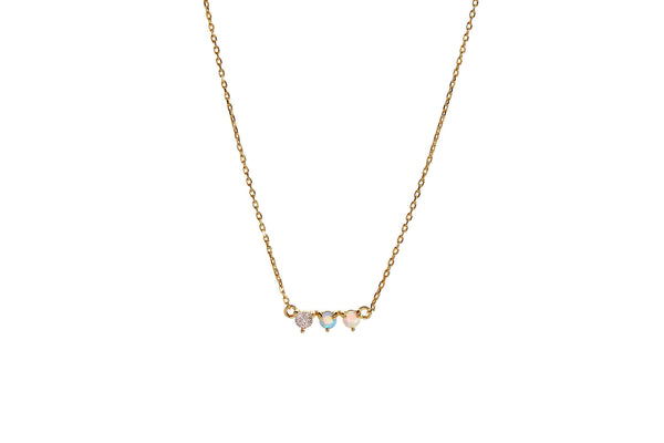 Starburst Opal Pendant Necklace featuring delicate opal stones on a 14k gold plated chain.