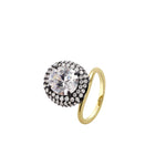 Pavé Perch Gold Plated Ring featuring a large sparkling stone surrounded by smaller crystals, showcasing elegance and craftsmanship.