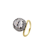 Pavé Perch Gold Plated Ring featuring a large sparkling stone surrounded by smaller crystals, showcasing elegance and craftsmanship.