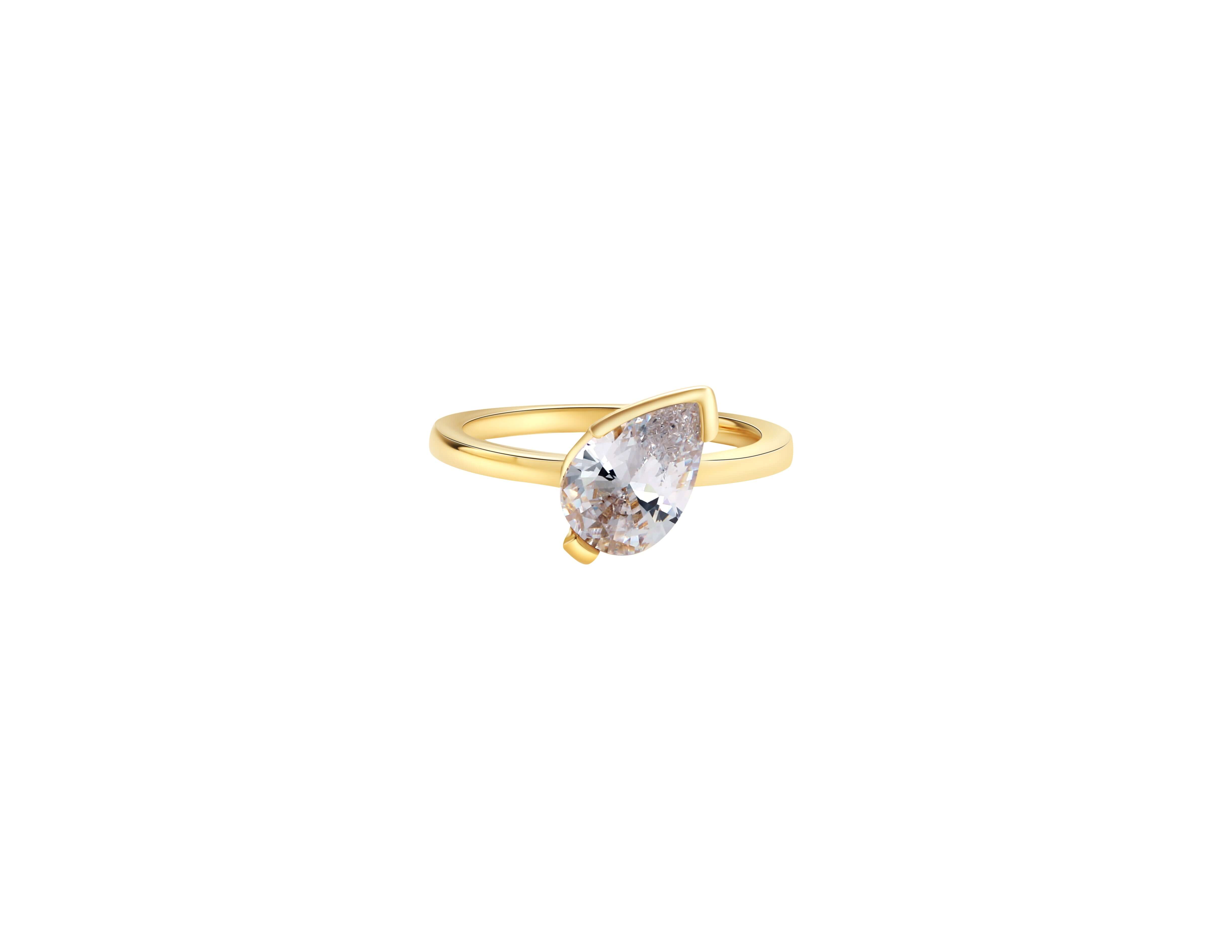 Love This For You Gold Tilted Pear Pinky Ring showcasing a stunning pear-cut stone on a gold band.