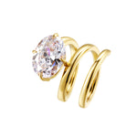 As Good As It Gets Coil Ring featuring a fluid design and oval-cut cubic zirconia, crafted in gold PVD plated brass.