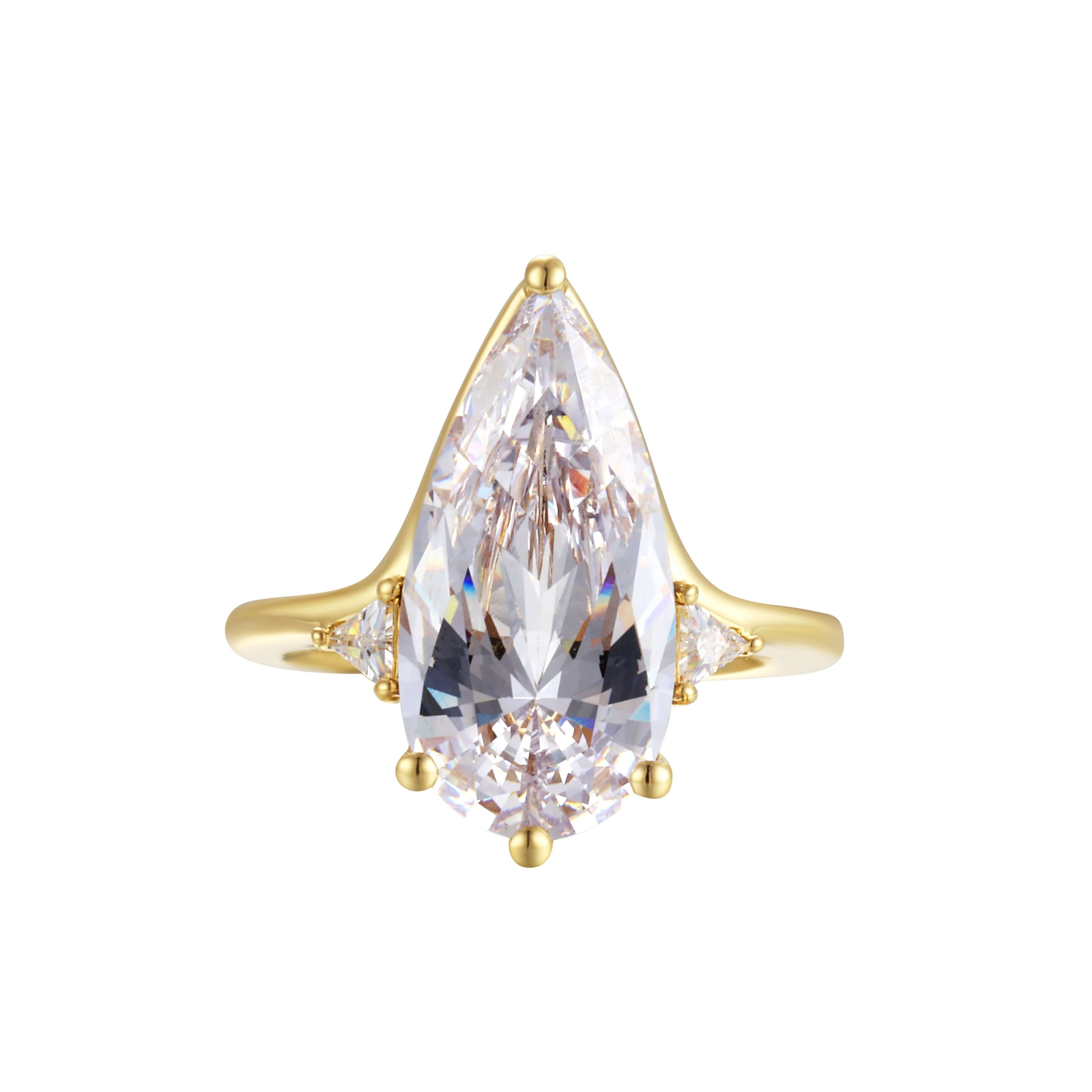 Nothing Like It Ring featuring a pear-cut cubic zirconia stone with delicate side stones and a gold band.