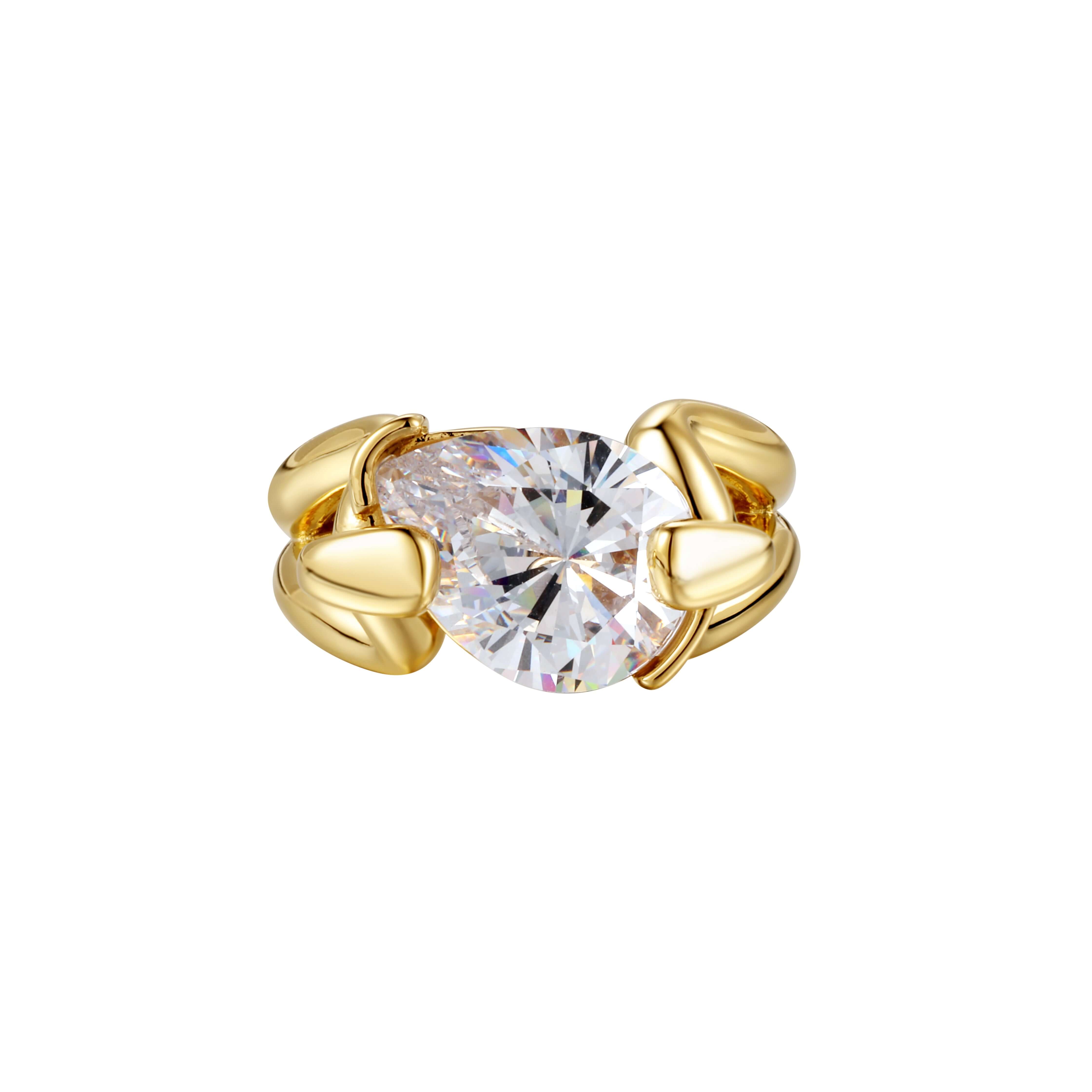 All Kinds Of Happy Ring featuring a pear-cut stone in sculptural gold claws, bold and luminous.