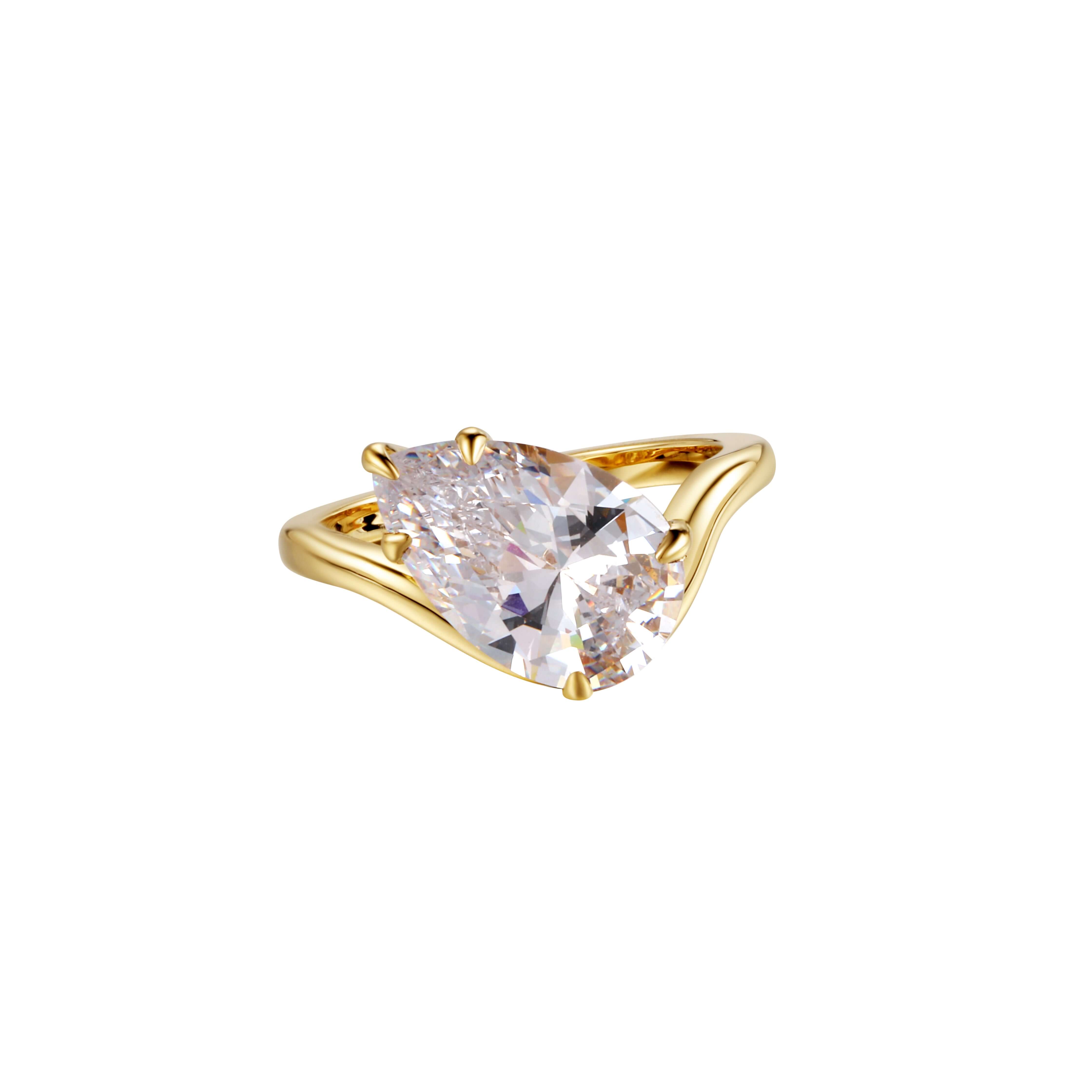 A Love Letter To You Tilted Pear Curve Ring featuring a pear-cut cubic zirconia in a gold-plated setting