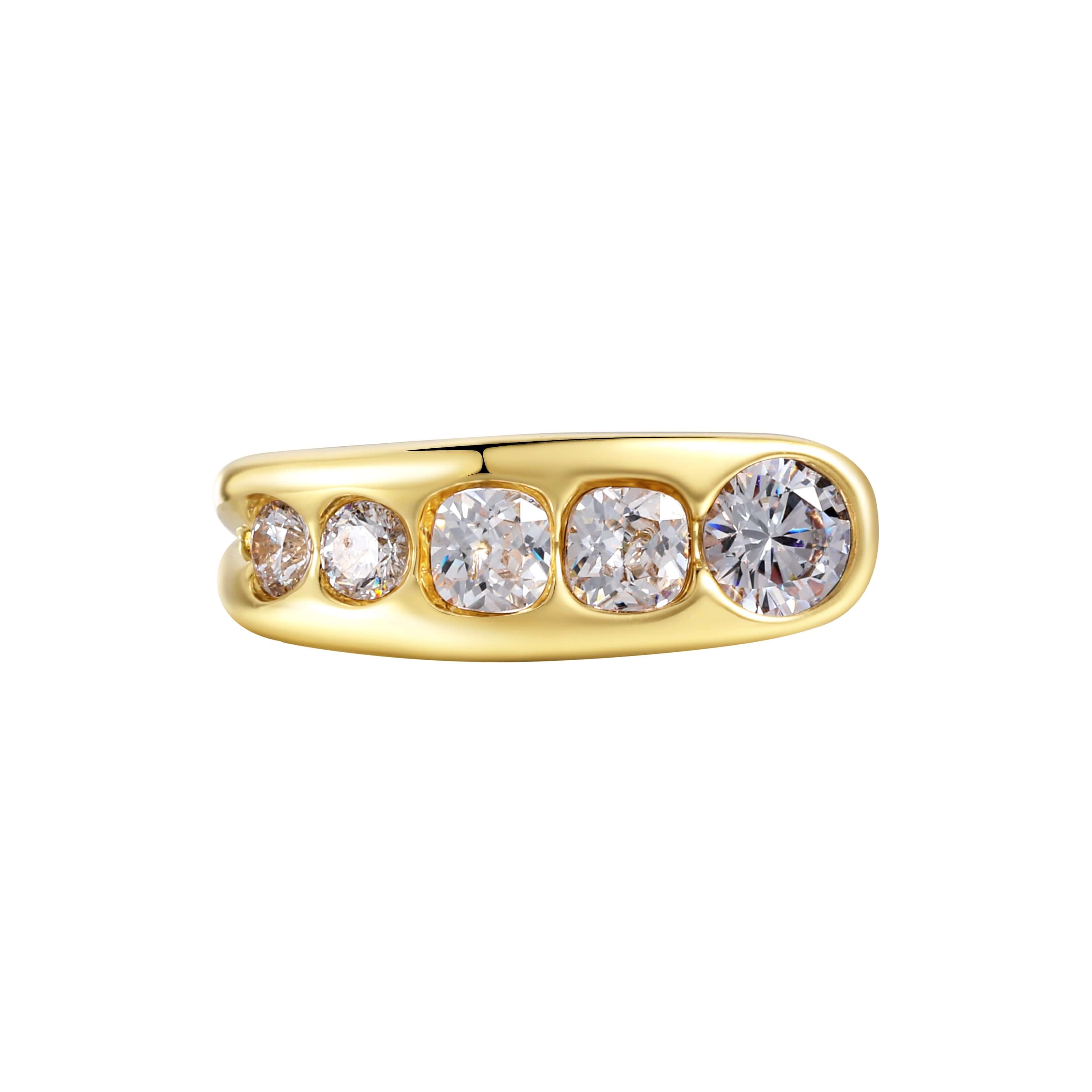 Iconic Ring featuring graduating bezel-set stones with a gold finish, perfect for stacking or wearing alone.