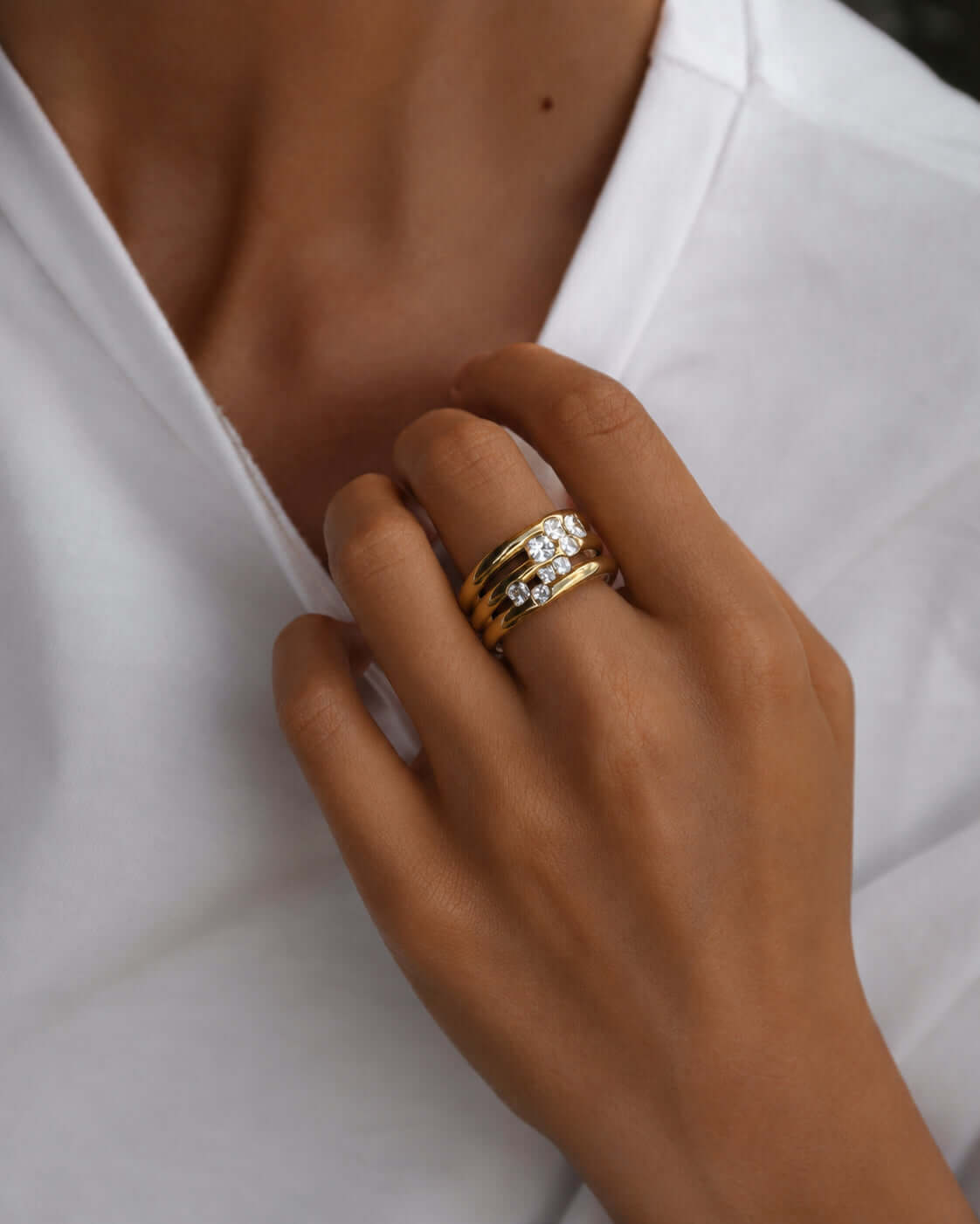 It’s All For Fun Cluster Ring worn on a hand showcasing its gold finish and cubic zirconia brilliance.