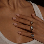 Girl Have Fun Ring collection displayed on a model's hand featuring elegant triangular-cut stones.