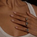 Girl Have Fun Ring collection displayed on a model's hand featuring elegant triangular-cut stones.